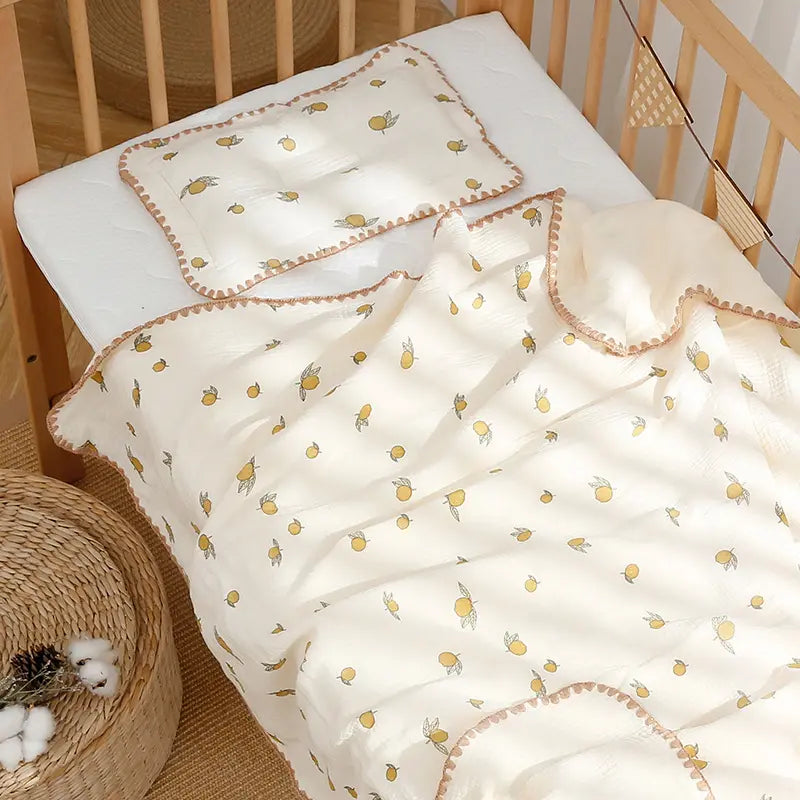 Grapefruit muslin swaddle blanket